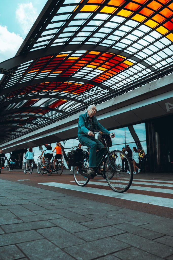 Older gentleman cycling in Netherlands