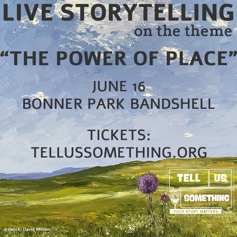 This is a square graphic designed for social media promotional use, featuring an impasto oil painting of a landscape as its background with superimposed text details for an event. Background Artwork Style: The background is a textured, thick-stroke impasto painting by artist David Wilson (credited in small white text in the bottom left corner). Subject: It depicts a vibrant green and yellow rolling hillside under a vast, textured blue sky filled with puffy white clouds. Foreground: In the lower right foreground, a tall, round purple allium or thistle-like flower stands out against the green hills. Text and Event Details The text is centered, bold, and colored in a dark charcoal gray. From top to bottom, it reads: LIVE STORYTELLING on the theme “THE POWER OF PLACE” JUNE 16 BONNER PARK BANDSHELL TICKETS: TELLUSSOMETHING.ORG Logo In the bottom right corner, there is a white line-art logo for "TELL US SOMETHING." The logo features text enclosed in interlocking speech bubbles with a small microphone icon and the tagline: "YOUR STORY MATTERS."